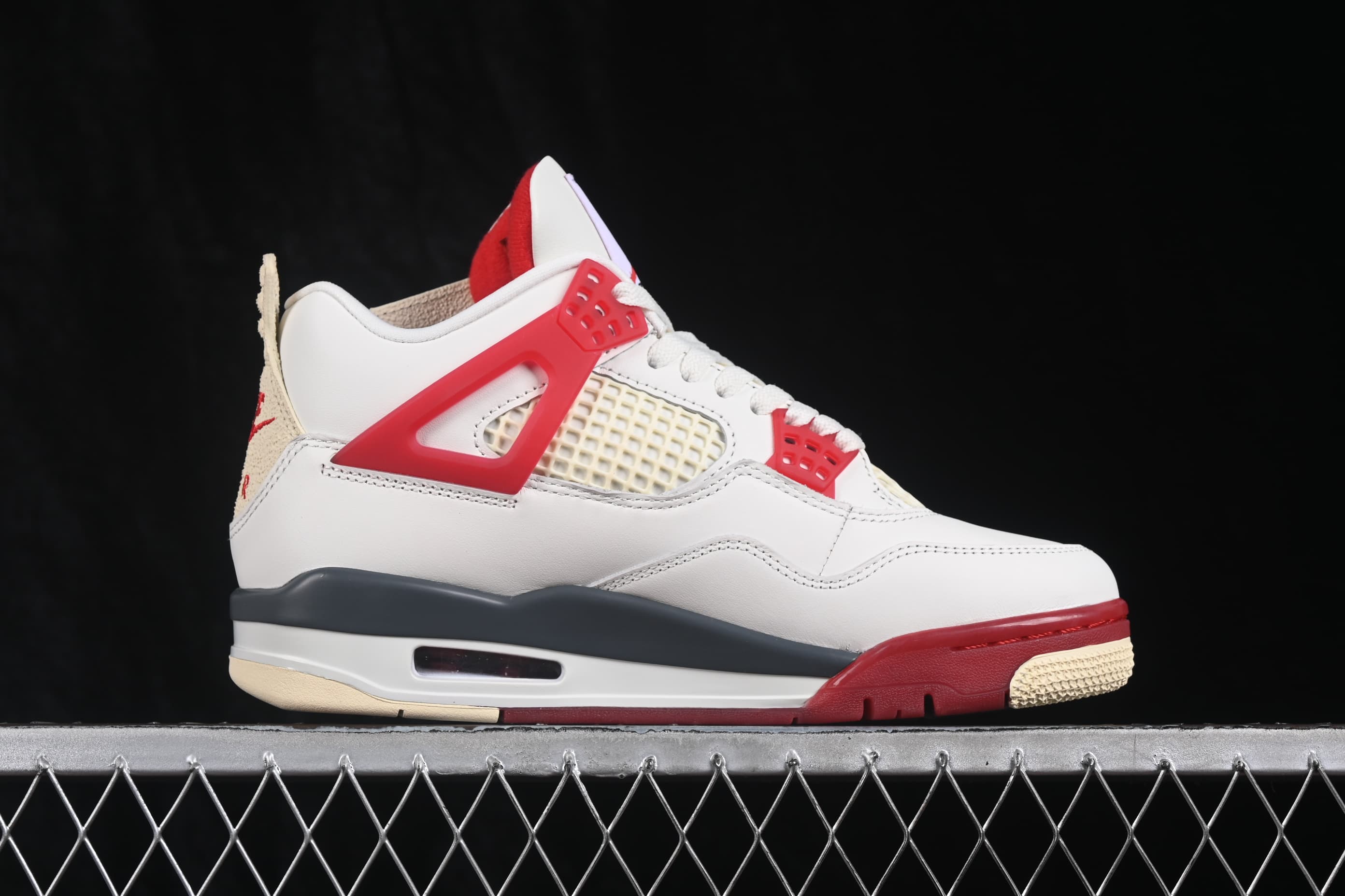 IQ8055-100 07.jpeg Nigel Sylvester x Air Jordan 4 Retro Brick After Brick