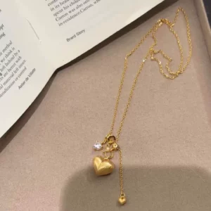 Gold-Tone Pendant Necklace with Peach Charm, Vintage Simple Style