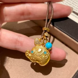 Gold Tone Elephant Pendant Necklace with Blue Beads