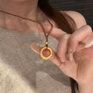 Braided Gold Tone Pendant Necklace with Ancient Style Peace Disc Motif, Unisex