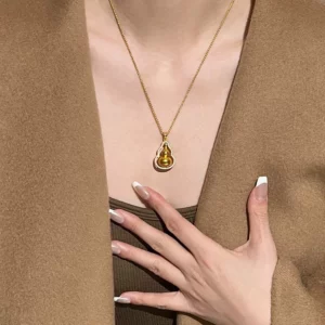 Long Chinese Style Rotating Hollow Gold Plated Necklace
