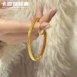 Brushed Gold-Tone Open Bangle Bracelet with Sparkling Faceted Design