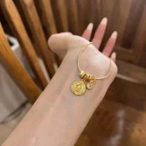 Gold-Tone Plated Fortune God Round Pendant Necklace with Engraved Mantra and Crystal Accents