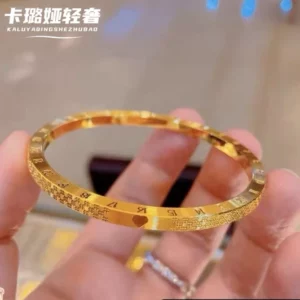 Gold-Toned Fashion Bangle with Heart and Clock Motif