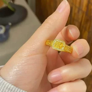 Gold-Tone Open Ring with Zaki Lhamo Motif and Cubic Zirconia