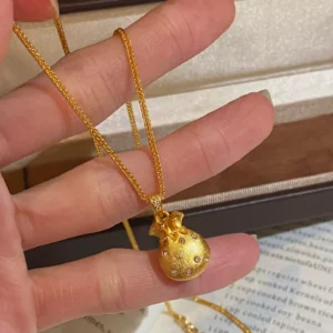 Gold Plated Alloy Small Fortune Pouch Pendant Necklace with Diamond Accents