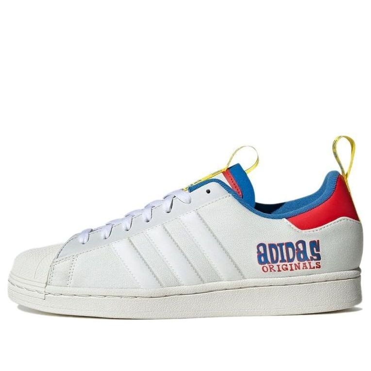 main-square_97993210-3832-4f22-b38c-8a91707080f9.jpg Tony s Chocolonely x adidas originals Unisex Superstar Low-Top Sneakers White