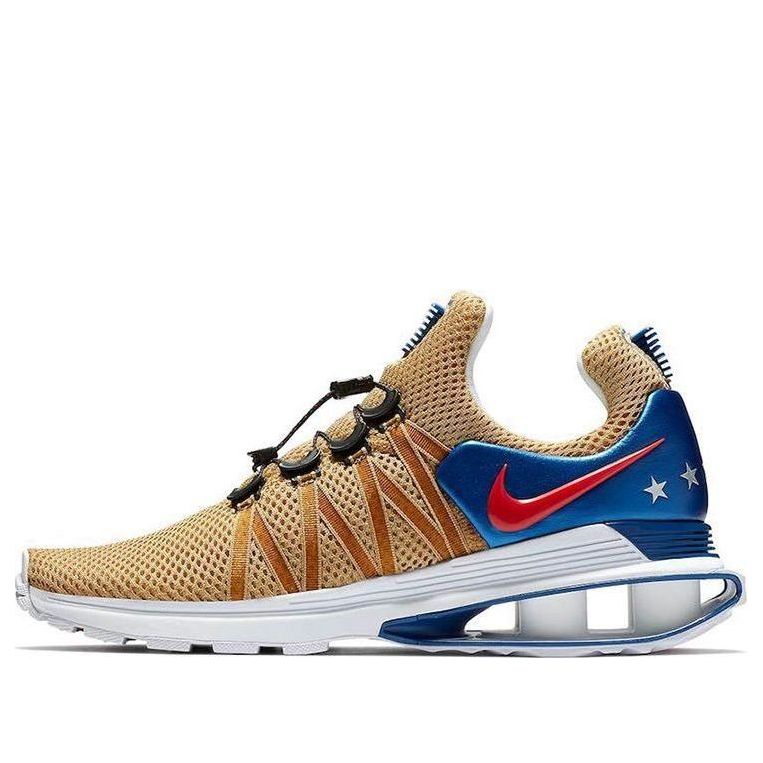 main-square_d788cfd6-09e5-4216-8a02-14d787e28a58.jpg Nike Shox Gravity Metallic Gold
